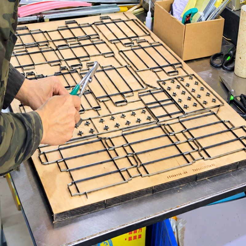 Die-cutting and creasing to the approved box dieline
